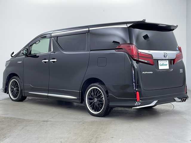 トヨタ アルファードハイブリット S 道央・札幌 2019(平31)年 5.7万km ブラック ・4WD/・純正ナビCD&DVD&SD&BT&フルセグTV/・LTA/・PKSB/・RSA/・クリアランスソナー/・レーダークルーズコントロール/・モデリスタフルエアロ/・純正フリップダウンモニター/・両側パワースライドドア/・バックカメラ/・ステアリングスイッチ/・純正フロアマット/・純正ドライブレコーダー/・100V1500W/・オートマチックハイビーム/・オートライト/・LEDヘッドライト/・LEDフォグ/・ウォークスルー/・スマートキー/・社外19インチAW