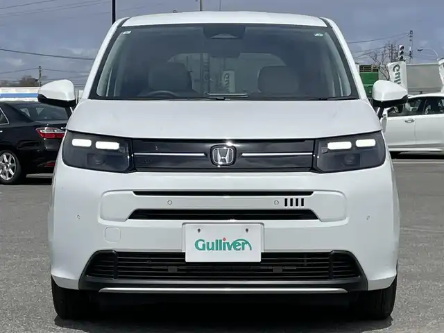 ホンダ フリード AIR EX 道央・札幌 2024(令6)年 0.6万km プラチナホワイトパール 純正ディーラーOPナビ/AM/FM/BT/フルセグ/衝突被害軽減ブレーキ/横滑り防止装置/アダプティブクルーズコントロール/レーンキープアシスト/クリアランスソナー/ブラインドスポットモニター/バックカメラ/ETC/ECONモード/両側パワースライドドア/前席シートヒーター/ハーフレザーシート/革巻きステアリング/ステアリングリモコン/電動パーキング/ブレーキホールド/プッシュスタート/スマートキー/LEDヘッドライト/オートライト/オートハイビーム/電動格納ミラー/ウィンカーミラー/純正フロアマット/スペアキー/レンタカー登録