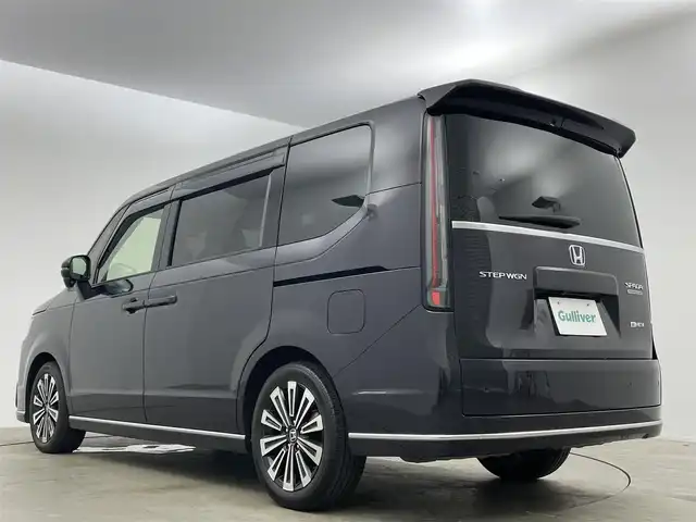 ホンダ ステップワゴン スパーダ eHEV プレミアムライン 岡山県 2022(令4)年 2.3万km トワイライトミストブラックパール 純正１１.4インチディスプレイオーディオ/（Bluetooth/フルセグTV/DVD/CD）/合皮ハーフレザー/オートハイビーム/衝突軽減ブレーキ/レーダークルーズコントロール/アラウンドビューモニター/ビルトインＥＴＣ/ＬＥＤヘッドライト/シートヒーター/純正ドライブレコーダー/オプションフロントグリル/USB接続/パドルシフト/ブラインドスポットモニター/両側パワースライドドア/取扱説明書/新車保証書/スマートキー×２