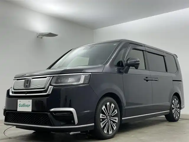 ホンダ ステップワゴン スパーダ eHEV プレミアムライン 岡山県 2022(令4)年 2.3万km トワイライトミストブラックパール 純正１１.4インチディスプレイオーディオ/（Bluetooth/フルセグTV/DVD/CD）/合皮ハーフレザー/オートハイビーム/衝突軽減ブレーキ/レーダークルーズコントロール/アラウンドビューモニター/ビルトインＥＴＣ/ＬＥＤヘッドライト/シートヒーター/純正ドライブレコーダー/オプションフロントグリル/USB接続/パドルシフト/ブラインドスポットモニター/両側パワースライドドア/取扱説明書/新車保証書/スマートキー×２