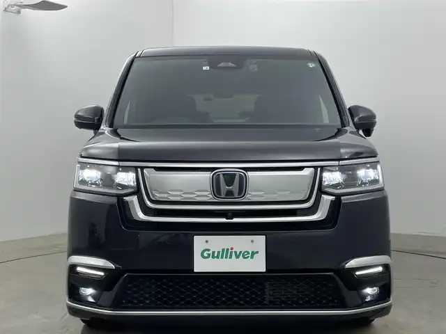 ホンダ ステップワゴン スパーダ eHEV プレミアムライン 岡山県 2022(令4)年 2.3万km トワイライトミストブラックパール 純正１１.4インチディスプレイオーディオ/（Bluetooth/フルセグTV/DVD/CD）/合皮ハーフレザー/オートハイビーム/衝突軽減ブレーキ/レーダークルーズコントロール/アラウンドビューモニター/ビルトインＥＴＣ/ＬＥＤヘッドライト/シートヒーター/純正ドライブレコーダー/オプションフロントグリル/USB接続/パドルシフト/ブラインドスポットモニター/両側パワースライドドア/取扱説明書/新車保証書/スマートキー×２