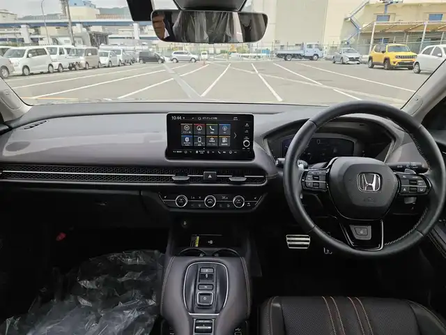 ホンダ ＺＲ－Ｖ ハイブリッド e:HEV Z 長崎県 2022(令4)年 1.4万km 赤Ｍ 純正9型ナビ/フルセグTV/ハンズフリーパワーバックドア/マルチビューカメラシステム/ビルトインETC2.0/ドライブレコーダー/渋滞追従機能付アダプティブクルーズコントロール/ソナーセンサー/ホンダセンシング/・衝突軽減ブレーキ/・誤発進抑制機能(前後)/・近距離衝突軽減ブレーキ/・歩行者事故低減ステアリング/・車線維持支援システム/・トラフィックジャムアシスト/・先行車発進お知らせ機能/・標識認識機能/・オートハイビーム/・ブラインドスポットインフォメーション/・後退出庫サポート/LEDヘッドランプ(オートレベリング機構)/本革巻きステアリング/ステアリングヒーター/パドルシフト/革シート/前席パワーシート/シートヒーター/運転席ドライビングポジションシステム/純正18インチアルミホイール/スマートキーシステム/BOSEプレミアムサウンドシステム/禁煙車