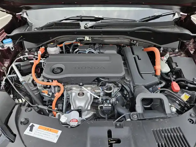 ホンダ ＺＲ－Ｖ ハイブリッド e:HEV Z 長崎県 2022(令4)年 1.4万km 赤Ｍ 純正9型ナビ/フルセグTV/ハンズフリーパワーバックドア/マルチビューカメラシステム/ビルトインETC2.0/ドライブレコーダー/渋滞追従機能付アダプティブクルーズコントロール/ソナーセンサー/ホンダセンシング/・衝突軽減ブレーキ/・誤発進抑制機能(前後)/・近距離衝突軽減ブレーキ/・歩行者事故低減ステアリング/・車線維持支援システム/・トラフィックジャムアシスト/・先行車発進お知らせ機能/・標識認識機能/・オートハイビーム/・ブラインドスポットインフォメーション/・後退出庫サポート/LEDヘッドランプ(オートレベリング機構)/本革巻きステアリング/ステアリングヒーター/パドルシフト/革シート/前席パワーシート/シートヒーター/運転席ドライビングポジションシステム/純正18インチアルミホイール/スマートキーシステム/BOSEプレミアムサウンドシステム/禁煙車
