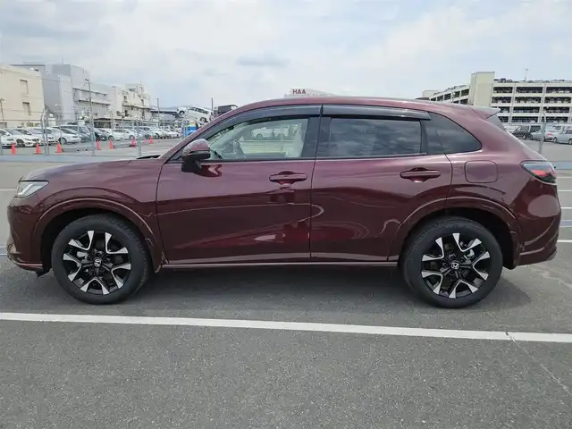 ホンダ ＺＲ－Ｖ ハイブリッド e:HEV Z 長崎県 2022(令4)年 1.4万km 赤Ｍ 純正9型ナビ/フルセグTV/ハンズフリーパワーバックドア/マルチビューカメラシステム/ビルトインETC2.0/ドライブレコーダー/渋滞追従機能付アダプティブクルーズコントロール/ソナーセンサー/ホンダセンシング/・衝突軽減ブレーキ/・誤発進抑制機能(前後)/・近距離衝突軽減ブレーキ/・歩行者事故低減ステアリング/・車線維持支援システム/・トラフィックジャムアシスト/・先行車発進お知らせ機能/・標識認識機能/・オートハイビーム/・ブラインドスポットインフォメーション/・後退出庫サポート/LEDヘッドランプ(オートレベリング機構)/本革巻きステアリング/ステアリングヒーター/パドルシフト/革シート/前席パワーシート/シートヒーター/運転席ドライビングポジションシステム/純正18インチアルミホイール/スマートキーシステム/BOSEプレミアムサウンドシステム/禁煙車