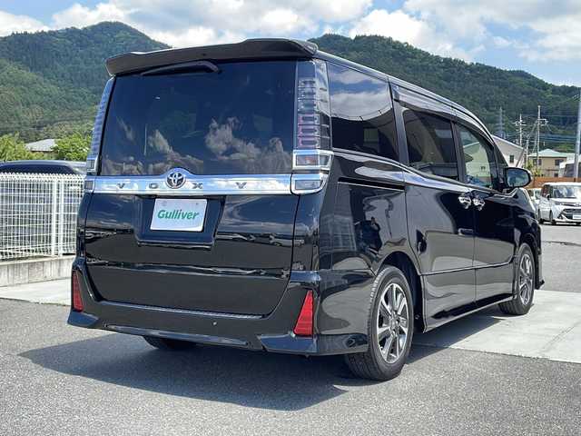 トヨタ ヴォクシー ZS 煌Ⅲ 山梨県 2021(令3)年 3.9万km イナズマスパーキングブラックガラスフレーク 純正ナビ/TV/CD/DVD/BT /バックモニター/ETC/ドラレコ/クルーズコントロール/両側パワスラ/フリップダウンモニター　/コーナーセンサー/オートマチックハイビーム　/レーンキープアシスト　/プッシュスタート/パワーウインドウ/純正フロアマット