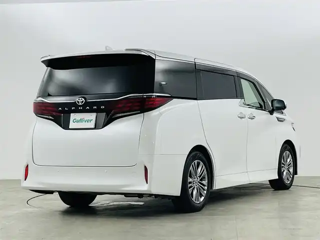 トヨタ アルファード Z 福島県 2023(令5)年 1.1万km プラチナホワイトパールマイカ トヨタセーフティセンス/・プリクラッシュセーフティ/・レーダークルーズコントロール/・プロアクティブドライビングアシスト/・レーントレーシングアシスト/・レーダークルーズコントロール/・ブラインドスポットモニター/・リアカメラディテクション/・クリアランスソナー/・リアクロストラフィックアラート/・ロードサインアシスト/純正14インチ大画面ナビ/・Bluetooth/USB/HDMI/・全方位カメラ/・ETC2.0/・ドライブレコーダー/・デジタルインナーミラー/・置くだけ充電/12.1インチフリップダウンモニター/ツインムーンルーフ/両側パワースライドドア/パワーバックドア/パーキングアシスト/電子パーキング/・オートホールド/革巻きステアリング/・ステアリングリモコン/・ステアリングヒーター/レザーシート/・シートヒーター(1/2列目)/・エアシート(1/2列目)/・パワーシート(1/2列目)/・メモリシート(運転席)/・オットマン/プッシュスタート/・スマートキー/・スペアキー/LEDヘッドライト/・オートライト/・フォグライト/社外ラバーマット/ドアバイザー/保証書/取扱説明書