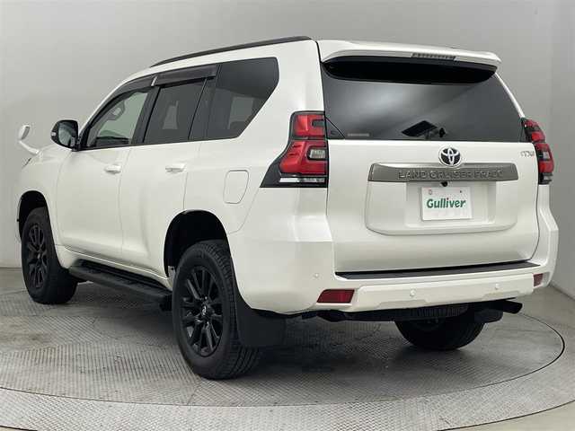トヨタ ランドクルーザー プラド TX-L 70thアニバーサリーLTD 道央・札幌 2021(令3)年 2万km ホワイトパールクリスタルシャイン ・４WD/・社外SDナビ/　CD/DVD/SD/BT/フルセグ/・バックカメラ/・ビルトインETC/・トヨタセーフティセンス/・プリクラッシュセーフティ/・レーダークルーズコントロール/・レーンキープアシスト/・オートハイビーム/・クリアランスソナー/・サドルタンレザーシート/・前席パワーシート/・前席エア/シートヒーター/・2ndstart/・ヘッドライトウォッシャー/・LEDヘッドライト/・フォグライト/・オートライト/・プッシュスタート/・スマートキー/・純正フロアマット/・ドアバイザー