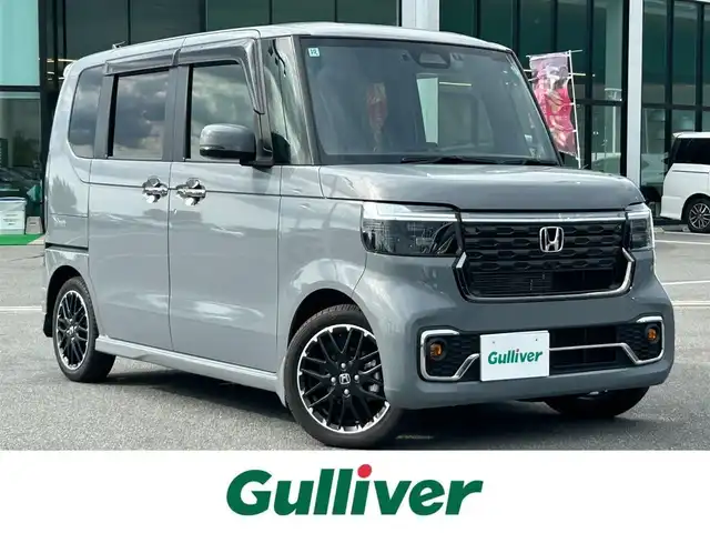 ホンダ Ｎ ＢＯＸ カスタム ターボ コーディネートS 奈良県 2024(令6)年 0.3万km グレー 純正ナビ　/フルセグ　/ＤＶＤ　/Bluetooth　/USB入力端子/AppleCarPlay/AndroidAuto/全方位カメラ/ETC　/前後ドライブレコーダー　/追従型クルーズコントロール　/レザーシート　/前席シートヒーター　/両側パワースライドドア　/純正フロアマット＆純正ラバーマット/純正アルミホイール/前後コーナーセンサー/衝突被害軽減ブレーキ/横滑り防止装置/車線逸脱警報/オートLEDライト/オートハイビーム/保証書/取扱説明書/W+サイド+カーテンエアバッグ
