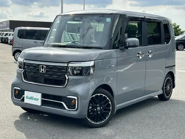 ホンダ Ｎ ＢＯＸ カスタム ターボ コーディネートS 奈良県 2024(令6)年 0.3万km グレー 純正ナビ　/フルセグ　/ＤＶＤ　/Bluetooth　/USB入力端子/AppleCarPlay/AndroidAuto/全方位カメラ/ETC　/前後ドライブレコーダー　/追従型クルーズコントロール　/レザーシート　/前席シートヒーター　/両側パワースライドドア　/純正フロアマット＆純正ラバーマット/純正アルミホイール/前後コーナーセンサー/衝突被害軽減ブレーキ/横滑り防止装置/車線逸脱警報/オートLEDライト/オートハイビーム/保証書/取扱説明書/W+サイド+カーテンエアバッグ