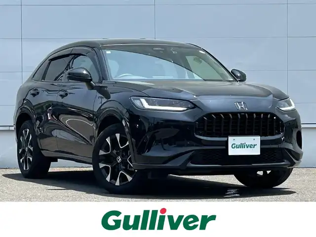 ホンダ ＺＲ－Ｖ ハイブリッド e:HEV Z 佐賀県 2023(令5)年 1.7万km クリスタルブラックパール ホンダセンシング/ブラインドスポットインフォメーション/アダプティブクルーズコントロール/パーキングセンサー/後退出庫サポート/BOSEプレミアムサウンド/ホンダコネクトディスプレイ/・ナビ/・マルチビューカメラ/・フルセグTV/BT/純正前後ドラレコ(DRH-224SD)/レザーシート/・ドライビングポジションシステム/・パワーシート/・シートヒーター/ハンズフリーパワーテールゲート/革巻きステアリング/ステアリングヒーター/純正18インチAW/ワイヤレス充電/LEDヘッドライト/アダプティブドライビングビーム/トノカバー/フロアマット/エアバックW/サイド/カーテン/スペアキー×１/取扱説明書/保証書