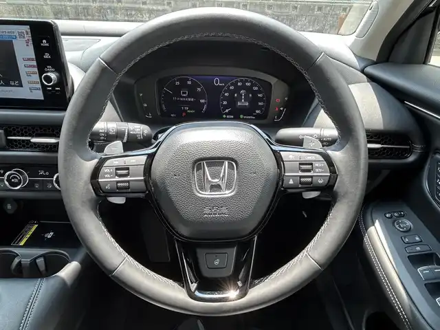 ホンダ ＺＲ－Ｖ ハイブリッド e:HEV Z 佐賀県 2023(令5)年 1.7万km クリスタルブラックパール ホンダセンシング/ブラインドスポットインフォメーション/アダプティブクルーズコントロール/パーキングセンサー/後退出庫サポート/BOSEプレミアムサウンド/ホンダコネクトディスプレイ/・ナビ/・マルチビューカメラ/・フルセグTV/BT/純正前後ドラレコ(DRH-224SD)/レザーシート/・ドライビングポジションシステム/・パワーシート/・シートヒーター/ハンズフリーパワーテールゲート/革巻きステアリング/ステアリングヒーター/純正18インチAW/ワイヤレス充電/LEDヘッドライト/アダプティブドライビングビーム/トノカバー/フロアマット/エアバックW/サイド/カーテン/スペアキー×１/取扱説明書/保証書