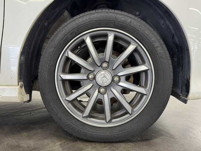 ホンダ Ｎ ＷＧＮ カスタム G Lパッケージ 三重県 2015(平27)年 6.9万km プレミアムホワイトパールⅡ ガソリン/FF/インパネCVT/純正 7インチナビ VXM-155VSi/（FM/AM/CD/DVD/USB/iPod/SD/Bluetooth/TV/VTR/AUX）/バックカメラ/ETC/安全/・近距離衝突軽減ブレーキ（CTBA）/・VSA（ABS、TCS、横すべり抑制）/・サイド＆カーテンエアバッグシステム/装備/・ハーフレザーシート/・クルーズコントロール/・オートライト/・ディスチャージヘッドライト（HID）/・フロントフォグライト/・ステアリングスイッチ/・オートエアコン/・電動格納ドアミラー/・プッシュスタート/・スマートキーx2/・後席シートベルトインジケーター（ルームミラー内蔵）/・純正14inAW/など