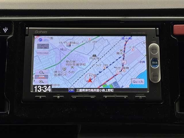 ホンダ Ｎ ＷＧＮ カスタム G Lパッケージ 三重県 2015(平27)年 6.9万km プレミアムホワイトパールⅡ ガソリン/FF/インパネCVT/純正 7インチナビ VXM-155VSi/（FM/AM/CD/DVD/USB/iPod/SD/Bluetooth/TV/VTR/AUX）/バックカメラ/ETC/安全/・近距離衝突軽減ブレーキ（CTBA）/・VSA（ABS、TCS、横すべり抑制）/・サイド＆カーテンエアバッグシステム/装備/・ハーフレザーシート/・クルーズコントロール/・オートライト/・ディスチャージヘッドライト（HID）/・フロントフォグライト/・ステアリングスイッチ/・オートエアコン/・電動格納ドアミラー/・プッシュスタート/・スマートキーx2/・後席シートベルトインジケーター（ルームミラー内蔵）/・純正14inAW/など