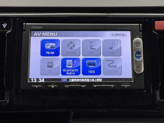 ホンダ Ｎ ＷＧＮ カスタム G Lパッケージ 三重県 2015(平27)年 6.9万km プレミアムホワイトパールⅡ ガソリン/FF/インパネCVT/純正 7インチナビ VXM-155VSi/（FM/AM/CD/DVD/USB/iPod/SD/Bluetooth/TV/VTR/AUX）/バックカメラ/ETC/安全/・近距離衝突軽減ブレーキ（CTBA）/・VSA（ABS、TCS、横すべり抑制）/・サイド＆カーテンエアバッグシステム/装備/・ハーフレザーシート/・クルーズコントロール/・オートライト/・ディスチャージヘッドライト（HID）/・フロントフォグライト/・ステアリングスイッチ/・オートエアコン/・電動格納ドアミラー/・プッシュスタート/・スマートキーx2/・後席シートベルトインジケーター（ルームミラー内蔵）/・純正14inAW/など