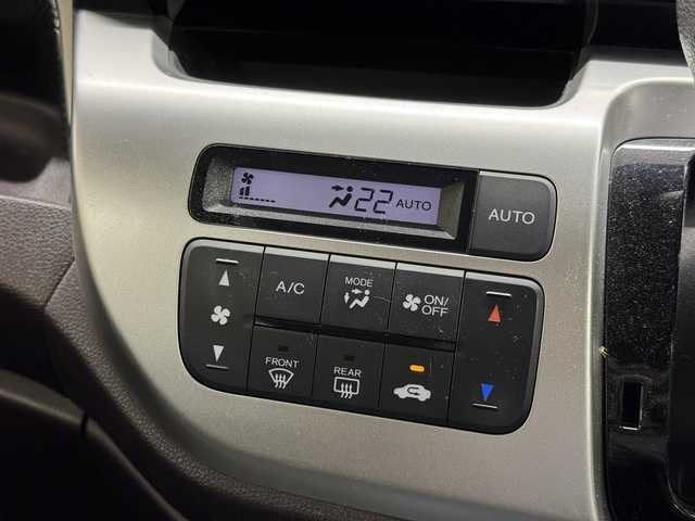 ホンダ Ｎ ＷＧＮ カスタム G Lパッケージ 三重県 2015(平27)年 6.9万km プレミアムホワイトパールⅡ ガソリン/FF/インパネCVT/純正 7インチナビ VXM-155VSi/（FM/AM/CD/DVD/USB/iPod/SD/Bluetooth/TV/VTR/AUX）/バックカメラ/ETC/安全/・近距離衝突軽減ブレーキ（CTBA）/・VSA（ABS、TCS、横すべり抑制）/・サイド＆カーテンエアバッグシステム/装備/・ハーフレザーシート/・クルーズコントロール/・オートライト/・ディスチャージヘッドライト（HID）/・フロントフォグライト/・ステアリングスイッチ/・オートエアコン/・電動格納ドアミラー/・プッシュスタート/・スマートキーx2/・後席シートベルトインジケーター（ルームミラー内蔵）/・純正14inAW/など
