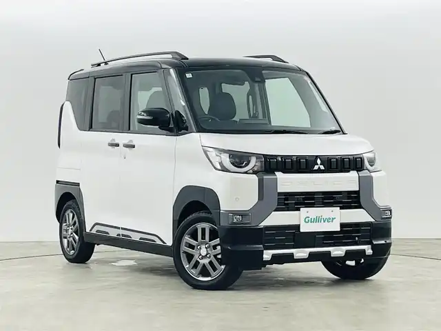 三菱 デリカミニ T プレミアム 福島県 2025(令7)年 0.1千km アメジストブラック/シルキーホワイト e-Assist/・衝突被害軽減ブレーキシステム［FCM］ /・誤発進抑制機能（前進時）/・車線逸脱警報システム［LDW］/・オートマチックハイビーム［AHB］/純正9インチディスプレイオーディオ/・AppleCarPlay/AndroidAuto/BT/AM/FM/USB/・全方位モニター/デジタルインナーミラー/両側パワースライドドア/後席サーキュレーター/革巻きステアリング/・ステアリングスイッチ/・オートクルーズコントロール/・ステアリングヒーター/・パドルシフト/ＬＥＤヘッドライト/・LEDフォグランプ/・オートライト/スマートキー/・プッシュスタート