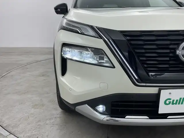 日産 エクストレイル G e－4ORCE 群馬県 2023(令5)年 1.3万km ブリリアントホワイトパール/スーパーブラック 2トーン サンルーフ　純正１２．３型ナビ　フルセグＴＶ　全周囲カメラ　ＢＯＳＥサウンド　プロパイロット　ヘッドアップディスプレイ　衝突被害軽減ブレーキ　電子ミラー　置くだけ充電　ＢＳＭ　ＥＴＣ２．０　禁煙