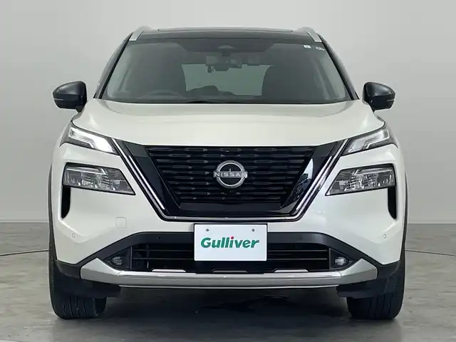 日産 エクストレイル G e－4ORCE 群馬県 2023(令5)年 1.3万km ブリリアントホワイトパール/スーパーブラック 2トーン サンルーフ　純正１２．３型ナビ　フルセグＴＶ　全周囲カメラ　ＢＯＳＥサウンド　プロパイロット　ヘッドアップディスプレイ　衝突被害軽減ブレーキ　電子ミラー　置くだけ充電　ＢＳＭ　ＥＴＣ２．０　禁煙