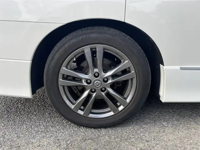 日産 エルグランド 250HWS アーバンクロム 宮城県 2013(平25)年 12.2万km ブリリアントホワイトパール 純正エアロ//純正ＡＷ//純正フロアマット//バックカメラ//ＥＴＣ//スペアキー//社外ＨＤＤナビ/(フルセグTV、DVD、CD、HDD、FM、AM、SD、BT)//スマートキー//両側パワースライド//横滑り防止機能//社外AW