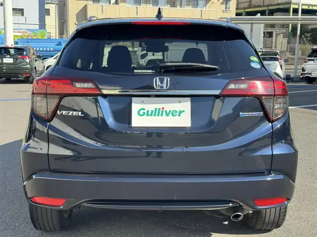 ホンダ ヴェゼル ハイブリッド Z ホンダセンシング 千葉県 2021(令3)年 4.9万km ミッドナイトブルービームM HV/Honda　SENSING/・コーナーセンサー/・衝突軽減システム/・レーンキープアシスト/純正7インチメモリーナビ/・バッグカメラ/・BT/・AM/FM/・CD/DVD/・フルセグTV/ハーフレザー/・シートヒーター/LEDヘッドライト/・オートライト/純正17インチＡＷ/リバース連動ミラー/電動パーキング/ＥＴＣ/W＋サイドエアバッグ/スマートキー/・スペアキー/保証書・取説