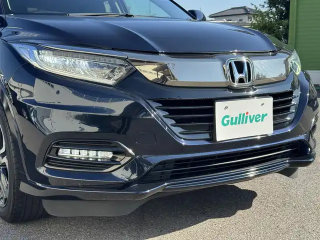 ホンダ ヴェゼル ハイブリッド Z ホンダセンシング 千葉県 2021(令3)年 4.9万km ミッドナイトブルービームM HV/Honda　SENSING/・コーナーセンサー/・衝突軽減システム/・レーンキープアシスト/純正7インチメモリーナビ/・バッグカメラ/・BT/・AM/FM/・CD/DVD/・フルセグTV/ハーフレザー/・シートヒーター/LEDヘッドライト/・オートライト/純正17インチＡＷ/リバース連動ミラー/電動パーキング/ＥＴＣ/W＋サイドエアバッグ/スマートキー/・スペアキー/保証書・取説