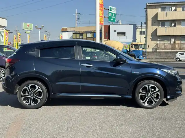 ホンダ ヴェゼル ハイブリッド Z ホンダセンシング 千葉県 2021(令3)年 4.9万km ミッドナイトブルービームM HV/Honda　SENSING/・コーナーセンサー/・衝突軽減システム/・レーンキープアシスト/純正7インチメモリーナビ/・バッグカメラ/・BT/・AM/FM/・CD/DVD/・フルセグTV/ハーフレザー/・シートヒーター/LEDヘッドライト/・オートライト/純正17インチＡＷ/リバース連動ミラー/電動パーキング/ＥＴＣ/W＋サイドエアバッグ/スマートキー/・スペアキー/保証書・取説