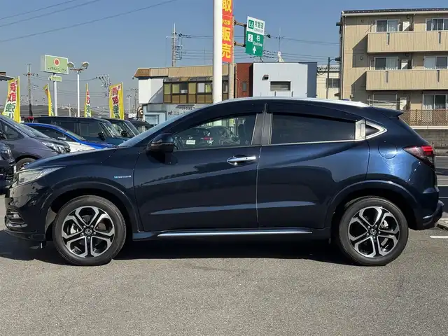 ホンダ ヴェゼル ハイブリッド Z ホンダセンシング 千葉県 2021(令3)年 4.9万km ミッドナイトブルービームM HV/Honda　SENSING/・コーナーセンサー/・衝突軽減システム/・レーンキープアシスト/純正7インチメモリーナビ/・バッグカメラ/・BT/・AM/FM/・CD/DVD/・フルセグTV/ハーフレザー/・シートヒーター/LEDヘッドライト/・オートライト/純正17インチＡＷ/リバース連動ミラー/電動パーキング/ＥＴＣ/W＋サイドエアバッグ/スマートキー/・スペアキー/保証書・取説