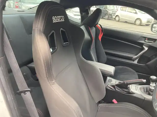 トヨタ ８６ GT 愛媛県 2013(平25)年 12万km サテンホワイトパール クスコタワーバー /スパルコセミバケットシート /後期テール /ケンウッドナビ /・CD/DVD/フルセグTV/Bluetooth/SD  /バックカメラ /ETC /HIDオートライト /純正アルミ /社外レーダー/取扱説明書/保証書/スペアキー