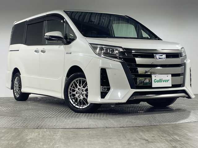 トヨタ ノア ハイブリッド Si ダブルバイビーⅡ 神奈川県 2019(令1)年 5万km ホワイトパールクリスタルシャイン トヨタセーフティセンス/純正10型ナビ【NSZN-Z68T】/・BT/フルセグTV/CD/DVD/SD/バックカメラ/純正12.1型フリップダウンモニター/デジタルインナーミラー/両側電動スライドドア/ハーフレザーシート/シートヒーター(D/N)/ビルトインETC2.0/革巻きステアリング/ステアリングスイッチ/クルーズコントロール/TRC/スマートキー/プッシュスタートボタン/シートリフター/LEDヘッドライト/フォグ/電動格納ミラー/ウィンカーミラー/二列目テーブル/二列目サンシェード/二列目USBポート/純正16インチアルミホイール/純正ドアバイザー/フロアマット