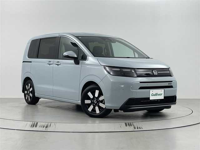 ホンダ フリード AIR EX 埼玉県 2024(令6)年 0.2万km フィヨルドミストパール ホンダセンシング/・レーダークルーズコントロール/・衝突被害軽減装置/・レーンキープアシスト/・ブラインドスポットモニター/純正9インチホンダコネクトナビ(LXM-242ZFNi)/フルセグ/Bluetooth/バックカメラ/両側パワースライドドア/ハーフレザーシート/D/N席シートヒーター/前後コーナーセンサー/前後ドライブレコーダー/電格ウィンカーミラー/LEDヘッドライト/オートライト/スマートキー