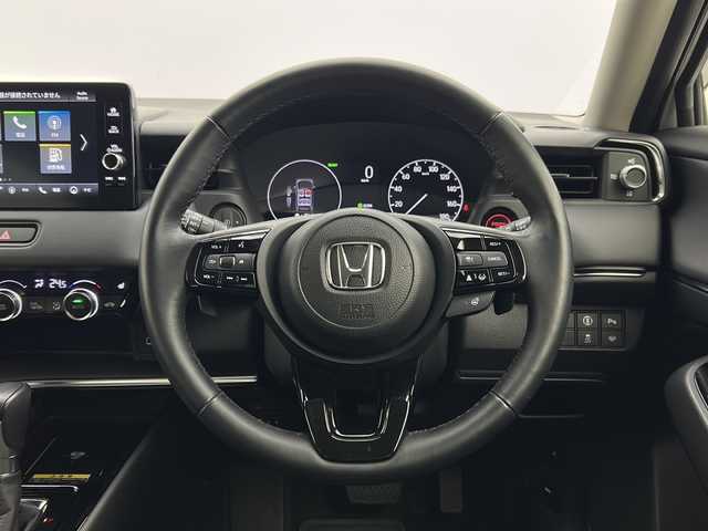 ホンダ ヴェゼル ハイブリッド e:HEV Z 宮城県 2022(令4)年 1.3万km プラチナホワイトパール 純正９インチナビ/（AM/FM/BT/Apple Car Play/Android Auto)/フルセグTV/レーダークルーズコントロール/パワーバックドア/前席シートヒーター/ステアリングヒーター/置くだけ充電/バックカメラ/ETC2.0/BSM/ハーフレザー/パドルシフト/前後コーナーセンサー/ダウンヒルアシストコントロール/LEDヘッドライト/純正18インチアルミホイール/純ドアバイザー