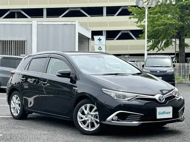 トヨタ オーリスハイブリッド 静岡県 2017(平29)年 3.8万km ブラックマイカ ワンオーナー/純正SDナビ（AM/FM/CD/TV/BT）/ビルトインETC/ムーンルーフ/2眼LEDヘッドライト/保証書/取扱説明書/ナビ取扱説明書