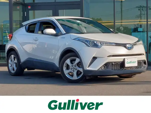 トヨタ Ｃ－ＨＲ ハイブリッド 1．8S 東京都 2017(平29)年 7.7万km ホワイトパールクリスタルシャイン Toyota Safety Sense P/・プリクラッシュセーフティシステム/・レーンディパーチャーアラート/・アダプティブハイビームシステム/・レーダークルーズコントロール/プッシュスタート/純正ナビ NSZT-W66T/フルセグTV/バックカメラ/ETC2.0/ドライブレコーダー/ドアバイザー/17インチ純正アルミホイール