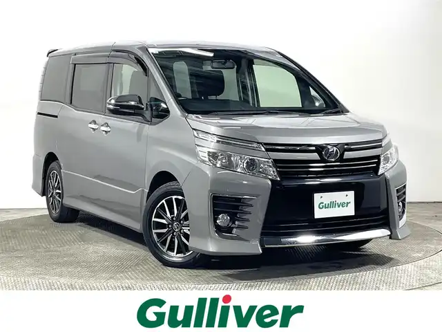トヨタ ヴォクシー ZS 煌 大阪府 2015(平27)年 6.4万km アイスチタニウムマイカメタリック 純正ナビ(フルセグ/DVD再生/Bluetooth) バックカメラ ETC 両側パワースライドドア オートライト オートエアコン 横滑り防止 スマートキー プッシュスタート フォグランプ