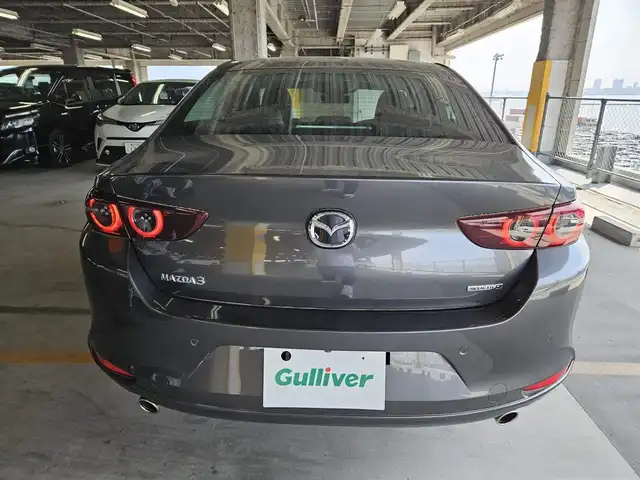 マツダ マツダ３セダン XD Lパッケージ 宮崎県 2019(令1)年 3.6万km マシーングレープレミアムM 純正8.8型ナビ(BT/CD/DVD)/フルセグTV/360度ビューモニター/全車速追従機能付レーダークルーズコントロール/パーキングセンサー/スマートブレーキサポート/AT誤発進抑制制御/クルージングトラフィックサポート/車線逸脱警報システム/レーンキーピングアシスト/前後側方接近車両検知/ブラインドスポットモニタリング/ドライバーアテンションアラート/交通標識認識システム/アクティブドライビングディスプレイ/ターボ/アダプティブLEDヘッドランプ/本革巻きステアリング/ステアリングヒーター/パドルシフト/ブラックパーフォレーション革シート/前席シートヒーター/運転席ドライビングポジションメモリー/バルミナ18インチアルミホイール/純正AWサマータイヤ積込/アドバンストキーレスエントリーシステム/禁煙車