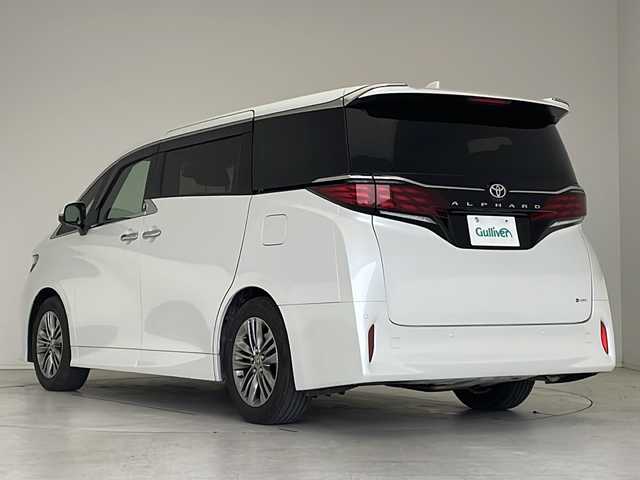 トヨタ アルファードハイブリット Z 愛知県 2024(令6)年 0.5万km プラチナホワイトパールマイカ 衝突軽減システム/純正１４型ディスプレイオーディオ（ナビあり）/フリップダウンモニター/三眼LEDヘッドライト/全方位カメラ/両側パワースライドドア/ガラスルーフ/レーダークルーズコントロール/シートヒーター/エアシート/フルセグ/Bluetooth/バックカメラ/電動リアゲート/パワーシート/ヘッドアップディスプレイ/コーナーセンサー/純正アルミホイール/ETC２．０/ブラインドスポットモニター/ステアリングヒーター/リアオートエアコン/オートマチックハイビーム/置くだけ充電器/ステアリングスイッチ/スマートキー/プッシュスタート