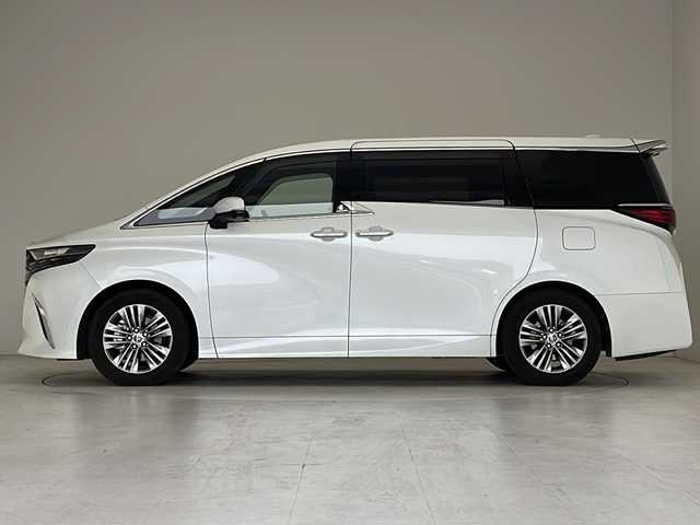 トヨタ アルファードハイブリット Z 愛知県 2024(令6)年 0.5万km プラチナホワイトパールマイカ 衝突軽減システム/純正１４型ディスプレイオーディオ（ナビあり）/フリップダウンモニター/三眼LEDヘッドライト/全方位カメラ/両側パワースライドドア/ガラスルーフ/レーダークルーズコントロール/シートヒーター/エアシート/フルセグ/Bluetooth/バックカメラ/電動リアゲート/パワーシート/ヘッドアップディスプレイ/コーナーセンサー/純正アルミホイール/ETC２．０/ブラインドスポットモニター/ステアリングヒーター/リアオートエアコン/オートマチックハイビーム/置くだけ充電器/ステアリングスイッチ/スマートキー/プッシュスタート