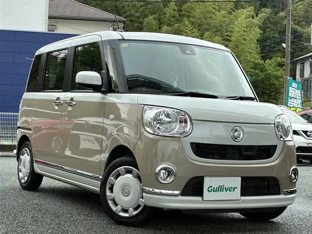 ダイハツ ムーヴ キャンバス X メイクアップ SA Ⅱ 熊本県 2016(平28)年 5.4万km パールホワイトⅢ/ナチュラルベージュマイカメタリック 2トーン ワンオーナー/社外カーオーディオ/【CD/USB】/両側パワースライドドア/衝突被害軽減システム/レーンキープアシスト/オートライト/プッシュスタート/スマートキー/横滑り防止装置/盗難防止装置/純正フロアマット/ダブルエアバック/保証書/取扱説明書