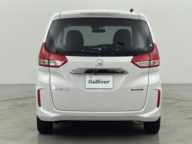 ホンダ フリード ハイブリット G ブラックスタイル 福岡県 2023(令5)年 3.2万km プラチナホワイトパール 純正ナビ　/バックカメラ　/ＥＴＣ　/アダプティブクルコン　/ホンダセンシング　/衝突被害軽減　/レーンキープ　/先行車発進お知らせ　/標識認識機能　/両側電動スライドドア　/シートヒーター　/純正１５インチＡＷ　/ＬＥＤヘッドライト