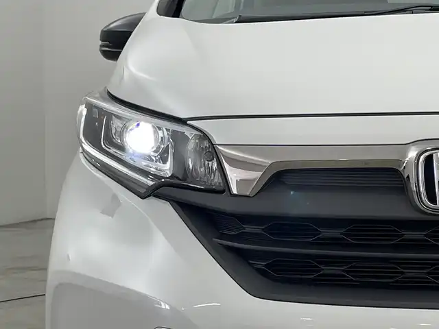 ホンダ フリード ハイブリット G ブラックスタイル 福岡県 2023(令5)年 3.2万km プラチナホワイトパール 純正ナビ　/バックカメラ　/ＥＴＣ　/アダプティブクルコン　/ホンダセンシング　/衝突被害軽減　/レーンキープ　/先行車発進お知らせ　/標識認識機能　/両側電動スライドドア　/シートヒーター　/純正１５インチＡＷ　/ＬＥＤヘッドライト