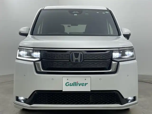 ホンダ ステップワゴン スパーダ eHEV 岡山県 2022(令4)年 3.9万km プラチナホワイトパール 純正11.4インチナビ/・FM/AM/Bluetooth/フルセグ/CD/DVD/バックカメラ/10.1インチフリップダウンモニター/パワーバックドア/ホンダセンシング/・衝突軽減ブレーキ/・車線逸脱警報/・アダプティブクルーズコントロール/・オートマチックハイビーム/・コーナーセンサー/前後ドライブレコーダー/ビルトインETC/パドルシフト/LEDヘッドライト/・フォグライト/電動パーキング/オートブレーキホールド/純正フロアマット