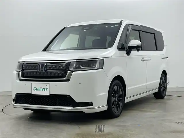 ホンダ ステップワゴン スパーダ eHEV 岡山県 2022(令4)年 3.9万km プラチナホワイトパール 純正11.4インチナビ/・FM/AM/Bluetooth/フルセグ/CD/DVD/バックカメラ/10.1インチフリップダウンモニター/パワーバックドア/ホンダセンシング/・衝突軽減ブレーキ/・車線逸脱警報/・アダプティブクルーズコントロール/・オートマチックハイビーム/・コーナーセンサー/前後ドライブレコーダー/ビルトインETC/パドルシフト/LEDヘッドライト/・フォグライト/電動パーキング/オートブレーキホールド/純正フロアマット