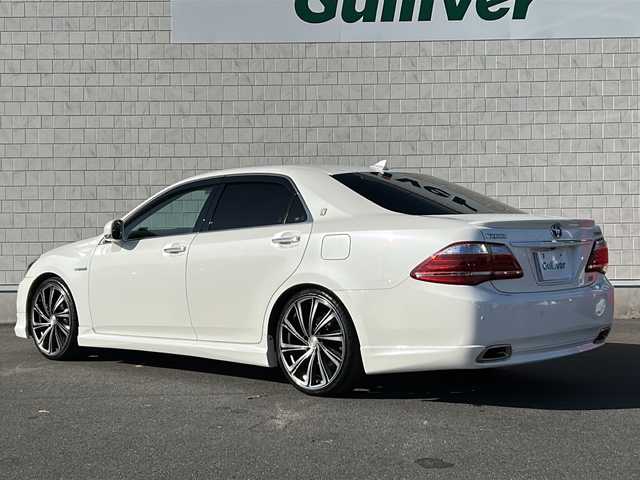 トヨタ クラウン ハイブリッド Gパッケージ 茨城県 2010(平22)年 7.8万km ホワイトパールクリスタルシャイン モデリスタフルエアロ/サンルーフ/純正HDDナビ/【フルセグTV/CD/DVD/HDD/ラジオ】/バック・サイドカメラ/レーダークルーズコントロール/ベージュ革シート/前席パワーシート/前席シートヒーター/エアーシート/運転席パワーシート/社外20インチAW/社外サスペンション/ビルトインETC/オートライト/純正フロアマット/純正ドアバイザー/プッシュスタート/スマートキー