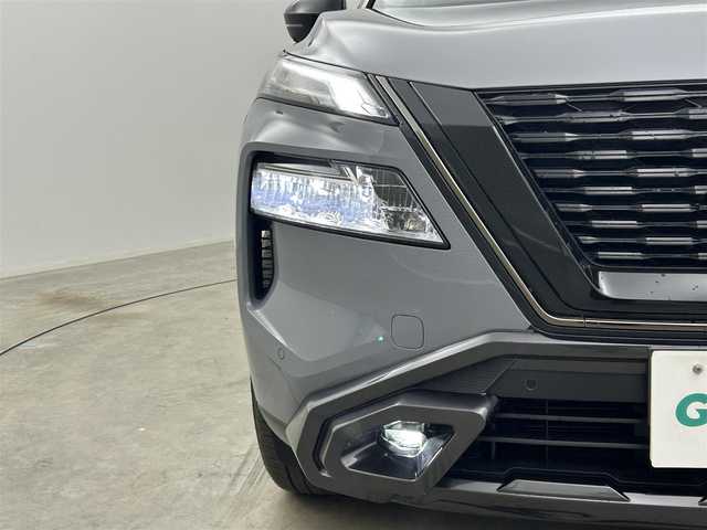 日産 エクストレイル X e－4ORCE エクストリーマーX 岡山県 2024(令6)年 0.5万km ステルスグレー/スーパーブラック 純正１２．３インチナビ　/プロパイロット　/全方位カメラ　/レーダークルーズコントロール　/１００Ｖ電源　/ＥＴＣ２．０　/シートヒーター　全席/ＬＥＤヘッドライト　/純正ドライブレコーダー　全方位/デジタルインナーミラー　/フォグライト/ステアリングヒーター/ブラインドスポットモニター/禁煙車/コーナーセンサー　前後/オートブレーキホールド/パワーシート　前席/シートメモリー/アダプティブヘッドライト