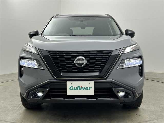 日産 エクストレイル X e－4ORCE エクストリーマーX 岡山県 2024(令6)年 0.5万km ステルスグレー/スーパーブラック 純正１２．３インチナビ　/プロパイロット　/全方位カメラ　/レーダークルーズコントロール　/１００Ｖ電源　/ＥＴＣ２．０　/シートヒーター　全席/ＬＥＤヘッドライト　/純正ドライブレコーダー　全方位/デジタルインナーミラー　/フォグライト/ステアリングヒーター/ブラインドスポットモニター/禁煙車/コーナーセンサー　前後/オートブレーキホールド/パワーシート　前席/シートメモリー/アダプティブヘッドライト