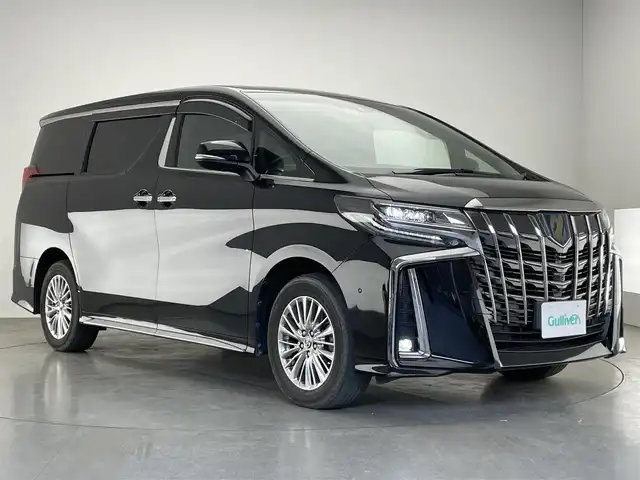 トヨタ アルファードハイブリット S タイプゴールドⅡ 愛知県 2021(令3)年 5.5万km ブラック メーカーナビ　フルセグＴＶ　ＪＢＬサウンド　全方位カメラ　ハーフレザー　ＡＣ１００Ｖ電源　前後ドラレコ　パーキングアシスト　三眼ＬＥＤ　電動リアゲート　両側パワスラ　衝突軽減　コーナーセンサー　トヨタセーフティセンス　レーダークルーズコントロール　フォグランプ　オットマン　ETC　禁煙車