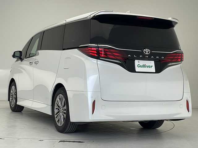 トヨタ アルファード Z 沖縄県 2024(令6)年 0.3万km プラチナホワイトパールマイカ 純正ディスプレイオーディオ　/(フルセグＴＶ/BT接続/Apple Car Play)/純正フリップダウンモニター　/ガラスルーフ　/パノラミックビューモニター　/両側パワースライドドア　/ユニバーサルステップ/レザーシート /メモリー付パワーシート　/二列目までエアシート/シートヒーター /パワーシート/パワーバックドア /カラーヘッドアップディスプレイ/デジタルインナーミラー　/ワイヤレス充電/ETC2.0