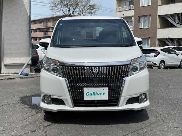 トヨタ エスクァイア Gi 道東・釧路十勝 2015(平27)年 7.9万km ホワイトパールクリスタルシャイン 4WD/7人乗り/寒冷地仕様/純正9インチメモリーナビ/  (DVD/CD/フルセグTV/Bluetooth)/全方位カメラ/黒革シート/前席シートヒーター/クルーズコントロール/LEDヘッドライト/フォグライト/オートマチックハイビーム/両側パワースライドドア/ウッドコンビハンドル/ステアリングリモコン/リアオートエアコン/ETC/ウィンカーミラー/電動格納ミラー/アイドリングストップ/横滑り防止装置/純正フロアマット/純正ドアバイザー/リアアンダースポイラー/純正エンジンスターター/スマートキー/エンジンプッシュスタート/スペアキー/取扱説明書/保証書/ナビ取説/社外17インチアルミホイール
