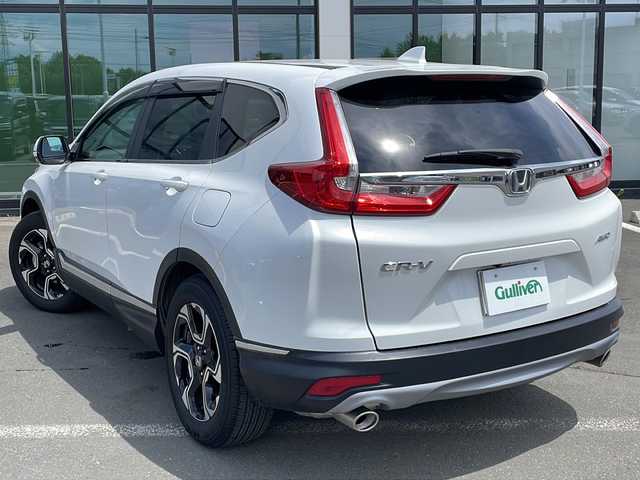 ホンダ ＣＲ－Ｖ EX 道東・釧路十勝 2022(令4)年 0.8万km プラチナホワイトパール ・４WD/・純正SDメモリナビ/（ＳＤ・ＣＤ・ＤＶＤ・フルセグ・ＡＭ・ＦＭ・ＢＴ）/・バックカメラ/・レーダークルーズコントロール/・純正エンジンスターター/・ホンダセンシング/・ステアリングヒーター/・革巻きステアリング/・パドルシフト/・横滑り防止装置/・レーンキープアシスト/・運転席パワーシート/・メモリーシート/・前席シートヒーター/・ヒーテッドドアミラー/・電動格納ミラー/・ドアバイザー/・純正フロアマット/・スマートキー/・プッシュスタート/・ブラインドスポットモニター/・社外アルミホイール付冬タイヤ積込