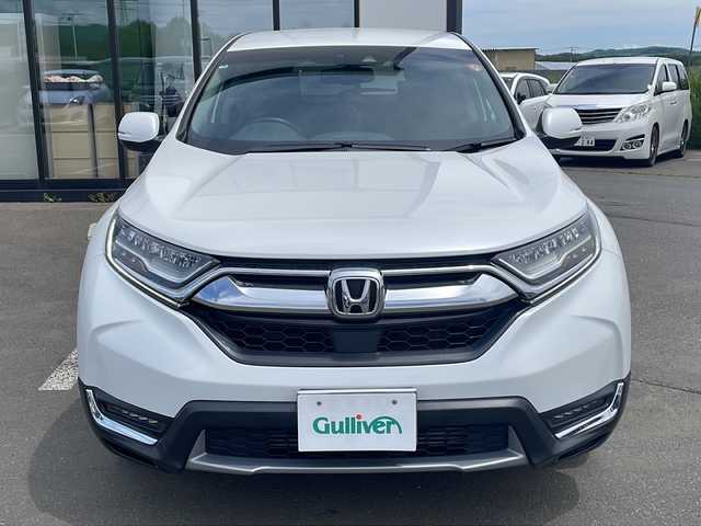 ホンダ ＣＲ－Ｖ EX 道東・釧路十勝 2022(令4)年 0.8万km プラチナホワイトパール ・４WD/・純正SDメモリナビ/（ＳＤ・ＣＤ・ＤＶＤ・フルセグ・ＡＭ・ＦＭ・ＢＴ）/・バックカメラ/・レーダークルーズコントロール/・純正エンジンスターター/・ホンダセンシング/・ステアリングヒーター/・革巻きステアリング/・パドルシフト/・横滑り防止装置/・レーンキープアシスト/・運転席パワーシート/・メモリーシート/・前席シートヒーター/・ヒーテッドドアミラー/・電動格納ミラー/・ドアバイザー/・純正フロアマット/・スマートキー/・プッシュスタート/・ブラインドスポットモニター/・社外アルミホイール付冬タイヤ積込